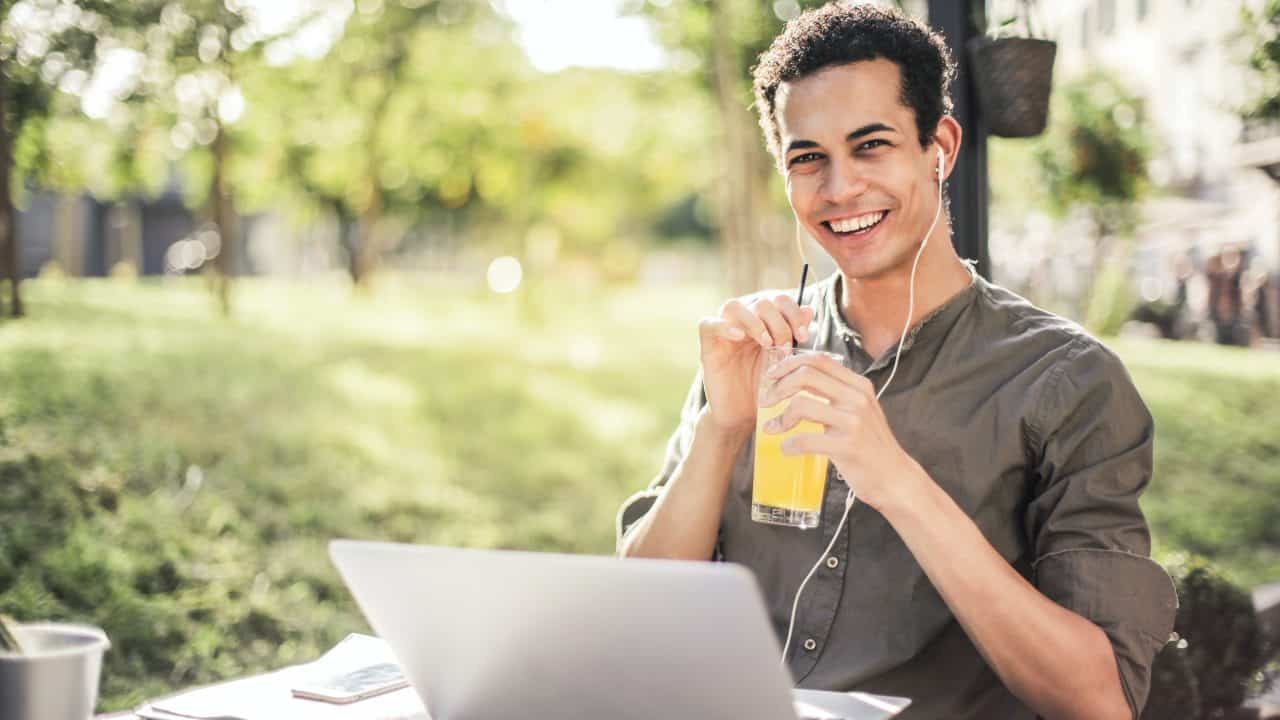 https://digitalhealthbuzz.com/wp-content/uploads/2020/05/happy-man-sitting-with-laptop-and-juice-in-park-3765030-1280x720.jpg